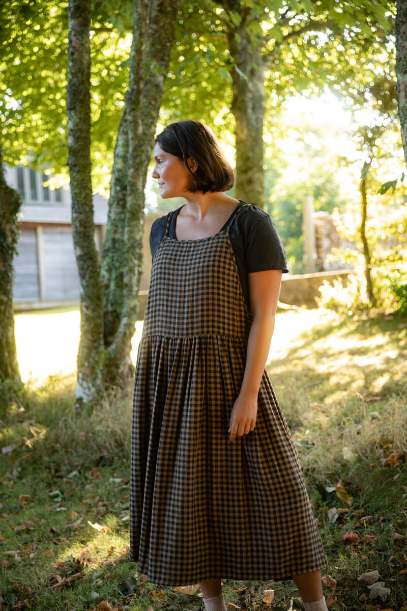 Woman wearing a chestnut gingham wren midi dress